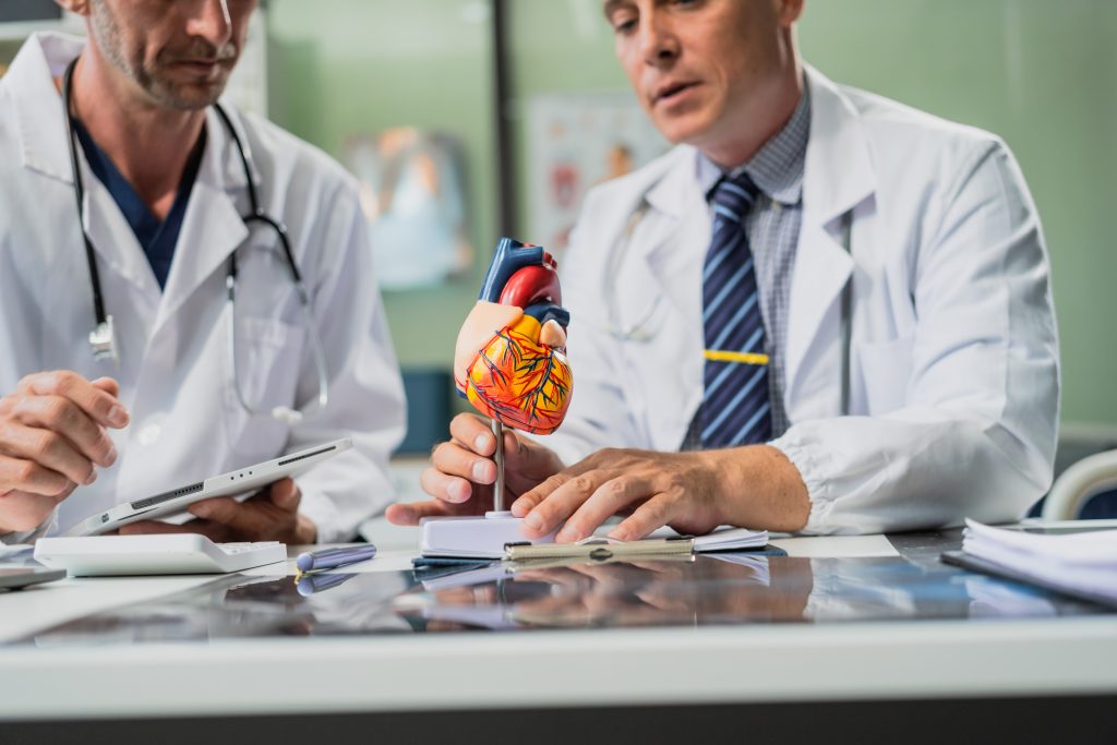 Cardiology Fellowship Program caucasian middle aged male doctor and italian scientific researc